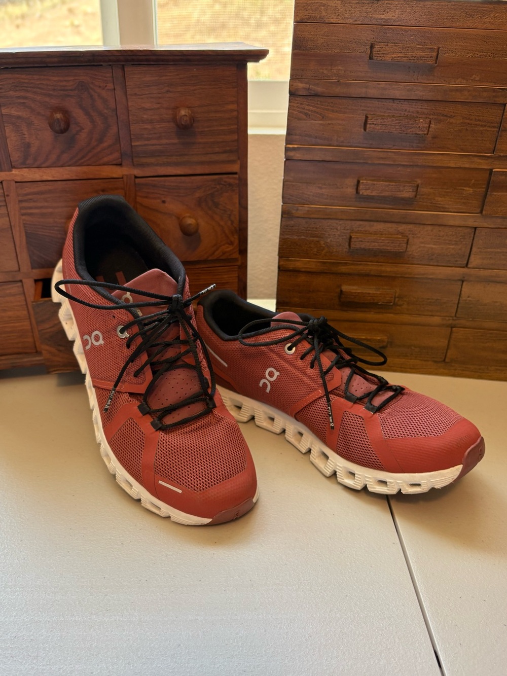 On women’s cloud 5 running shoes rust size 9.5